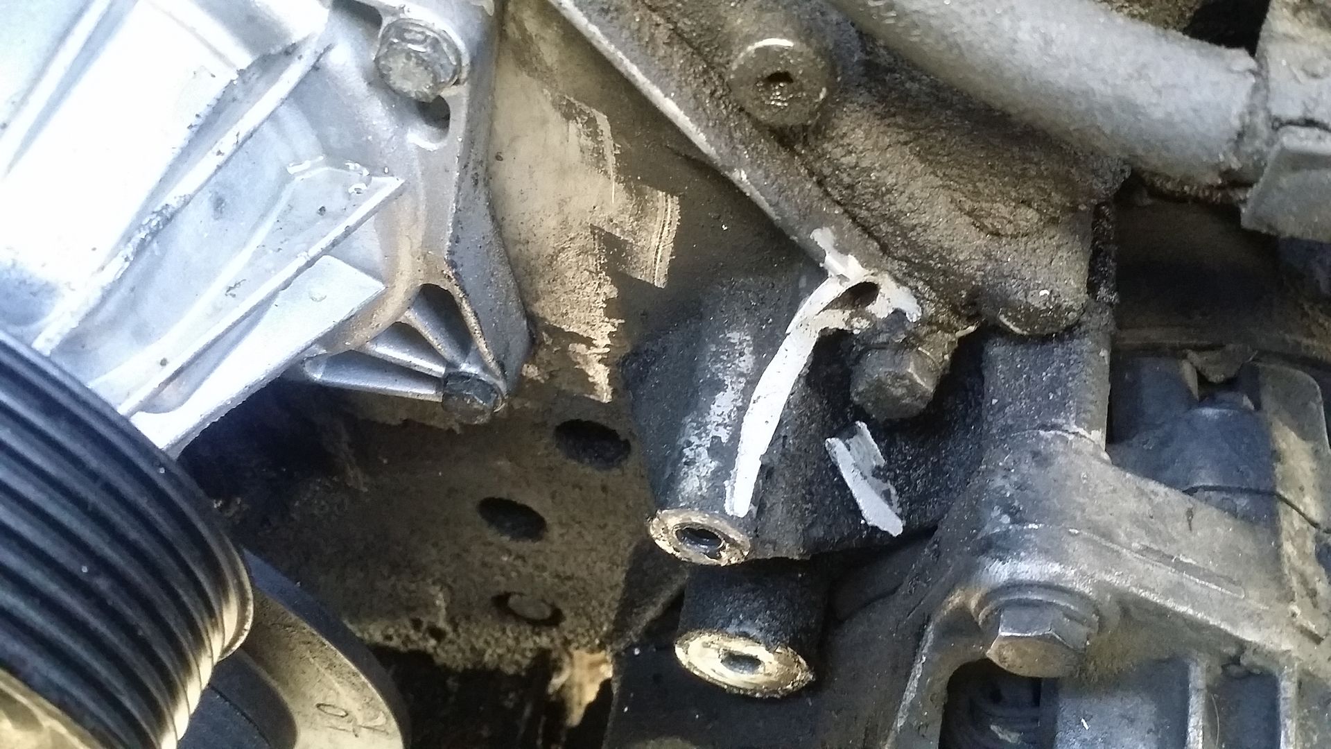 Did I just total my car? Serpentine Belt Tensioner Mount Broke off.